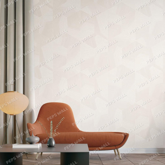 A modern interior scene featuring a large wall with a light beige and white geometric pattern, styled with an orange-brown lounge chair, a low dark coffee table, a paper lantern lamp, and minimalist vases.