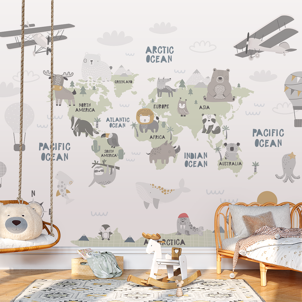 Children's room with a world map wall decal, wooden furniture, and toys.