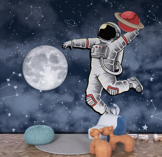 Wallpaper Kids Nursery Dubai Children's room with an astronaut wall decal, moon, and planet against a starry sky.