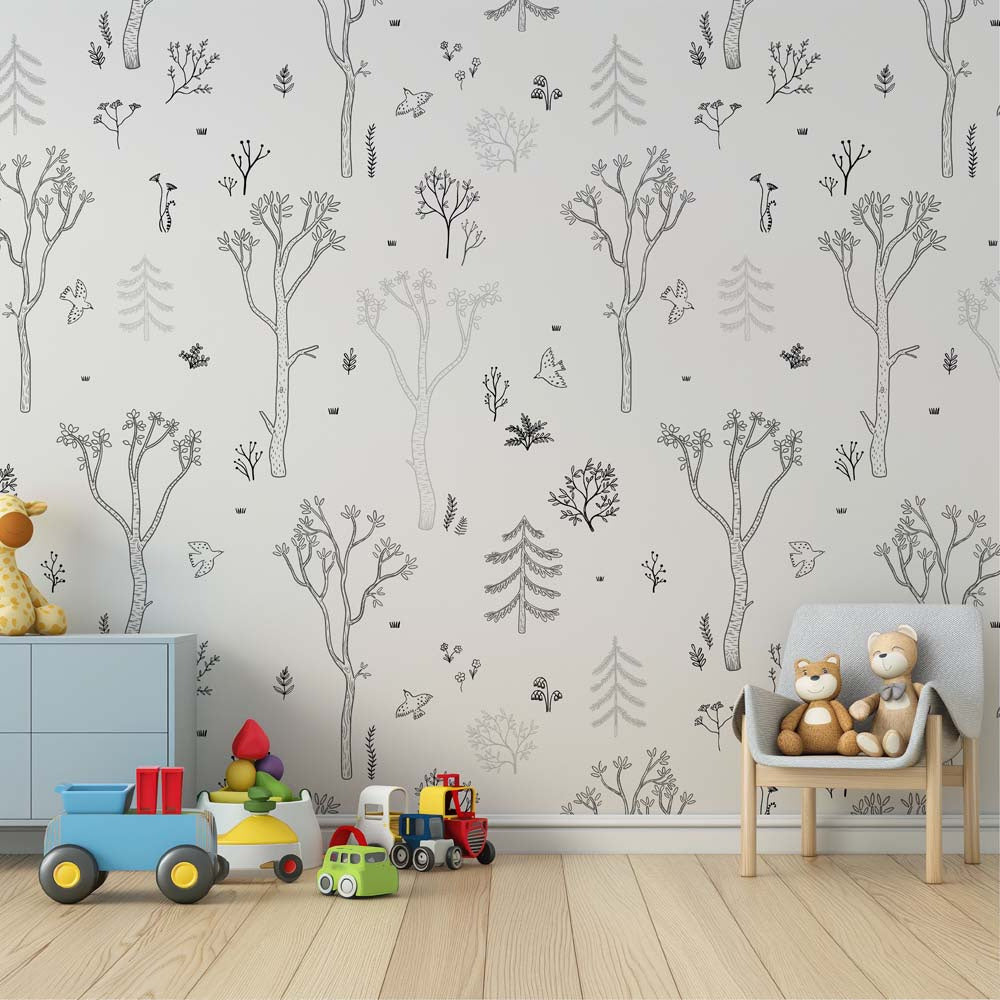 Wallpaper Kids Nursery Dubai Peps Wall Children's room with 'Forrest Trail - Light' wallpaper featuring black and gray tree patterns on a white background, along with various children's toys and a wooden chair.
