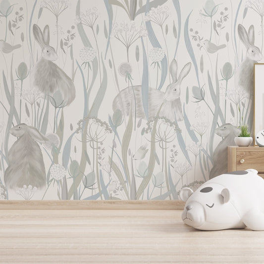 Wallpaper Kids Nursery Dubai Children's room with floral wallpaper, toys, and a wooden dresser.