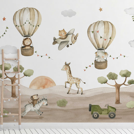 Wallpaper Kids Nursery Dubai Peps Wall A wall decal featuring a safari adventure scene with hot air balloons, animals such as a giraffe and a lion, trees, and a vehicle.
