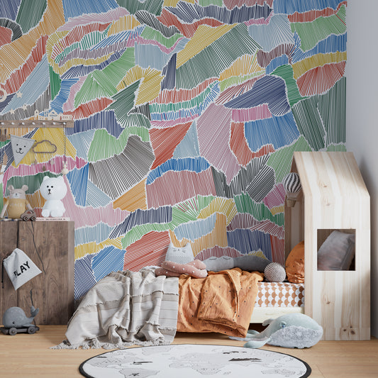 Wallpaper Kids Nursery Dubai Peps Wall A colorful geometric patterned wallpaper in a children's room, with a bed, toy car, and wooden furniture.