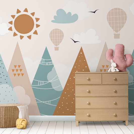 Wallpaper Kids Nursery Dubai Peps Wall Children's wall mural featuring stylized mountains with a sun, clouds, and hot air balloons pattern.