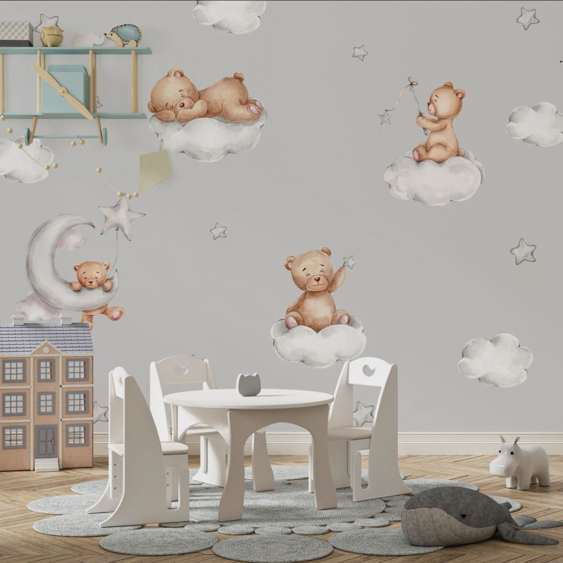 Wallpaper Kids Nursery Dubai Peps Wall Children's nursery room with wallpaper featuring cartoon teddy bears on a cloud-themed background, with a small wooden table and chairs in the foreground.