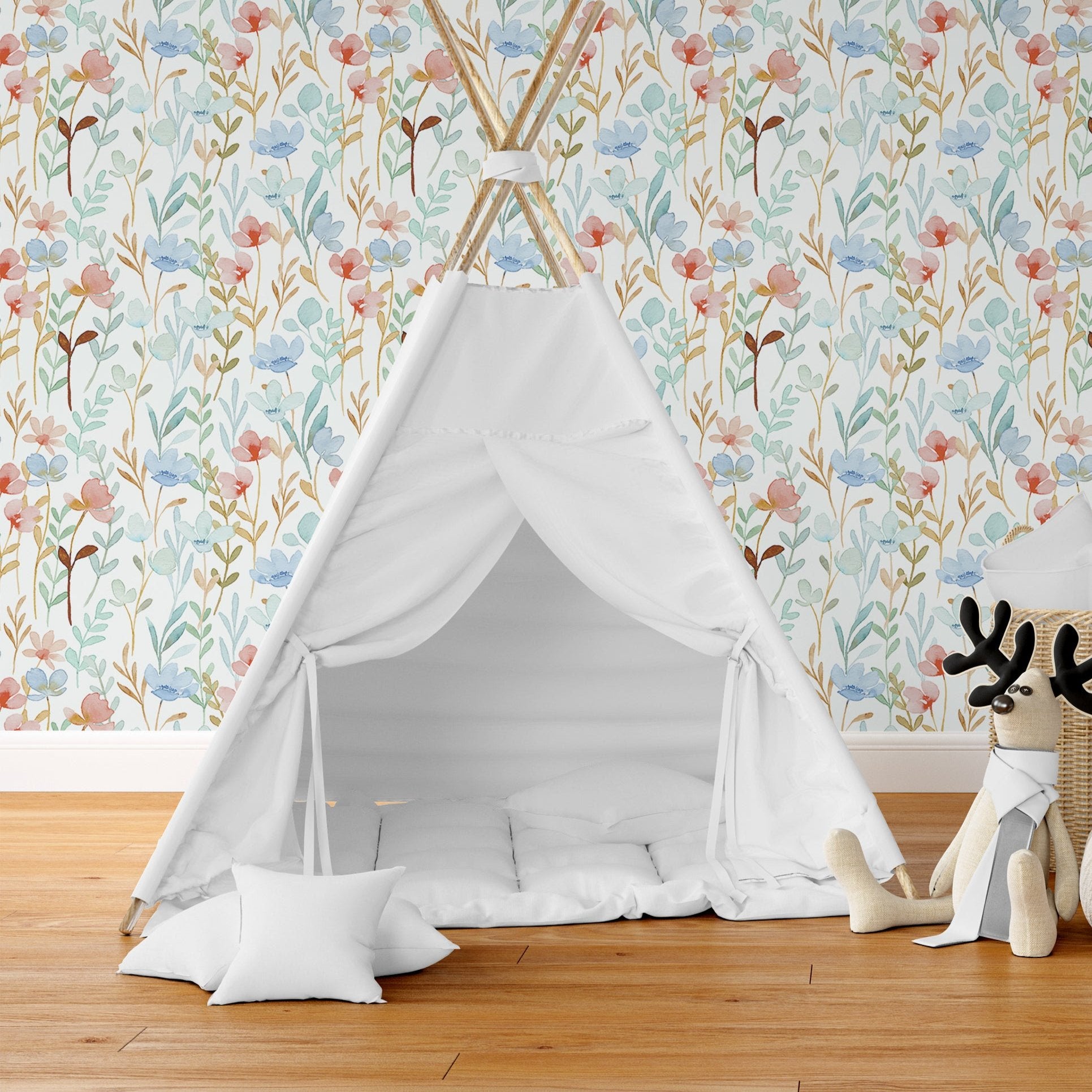 Wallpaper Kids Nursery Dubai Peps Wall A children's teepee with white fabric and a floral patterned wall in the background.
