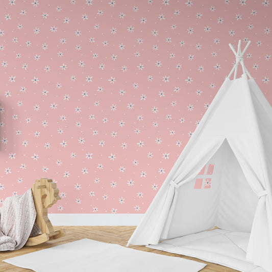 Wallpaper Kids Nursery Dubai Peps Wall Children's room with pink wallpaper featuring a floral pattern, and a white teepee tent in the corner.