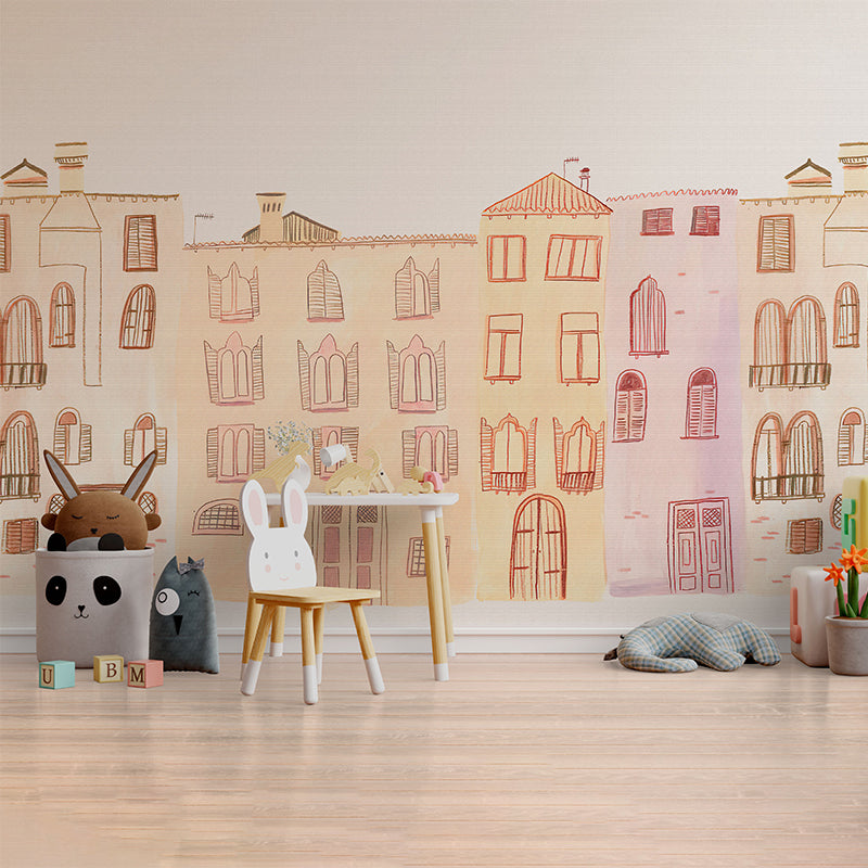 Wallpaper Kids Nursery Dubai Peps Wall A wallpaper featuring illustrated pastel-colored houses with cute patterns, displayed in a room with children's furniture and toys.