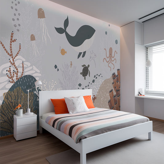 Wallpaper Kids Nursery Dubai Peps Wall A room with a white bed and a wall decorated with colorful whale and sea creature motifs.