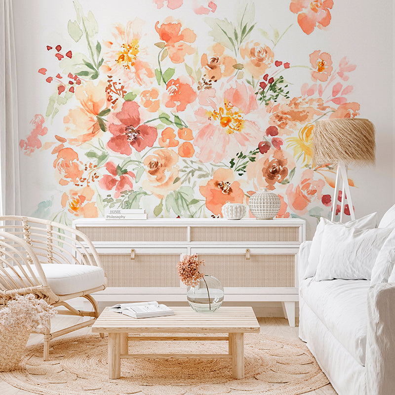 Wallpaper Kids Nursery Dubai Peps Wall A wall mural featuring a floral design with shades of pink, orange, and green applied to a wall in a living room setting with furniture and decorative items.