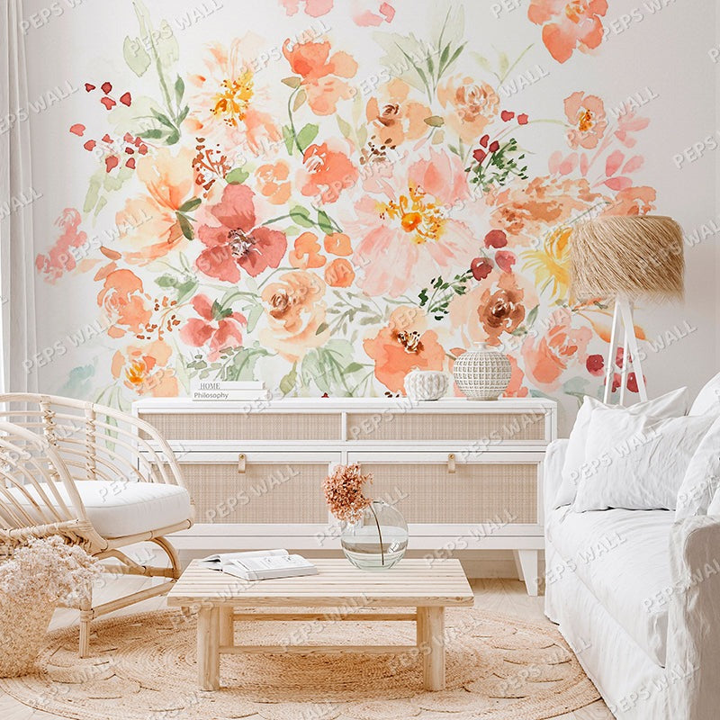 Wallpaper Kids Nursery Dubai Peps Wall A wall mural featuring a floral design with shades of pink, orange, and green applied to a wall in a living room setting with furniture and decorative items.
