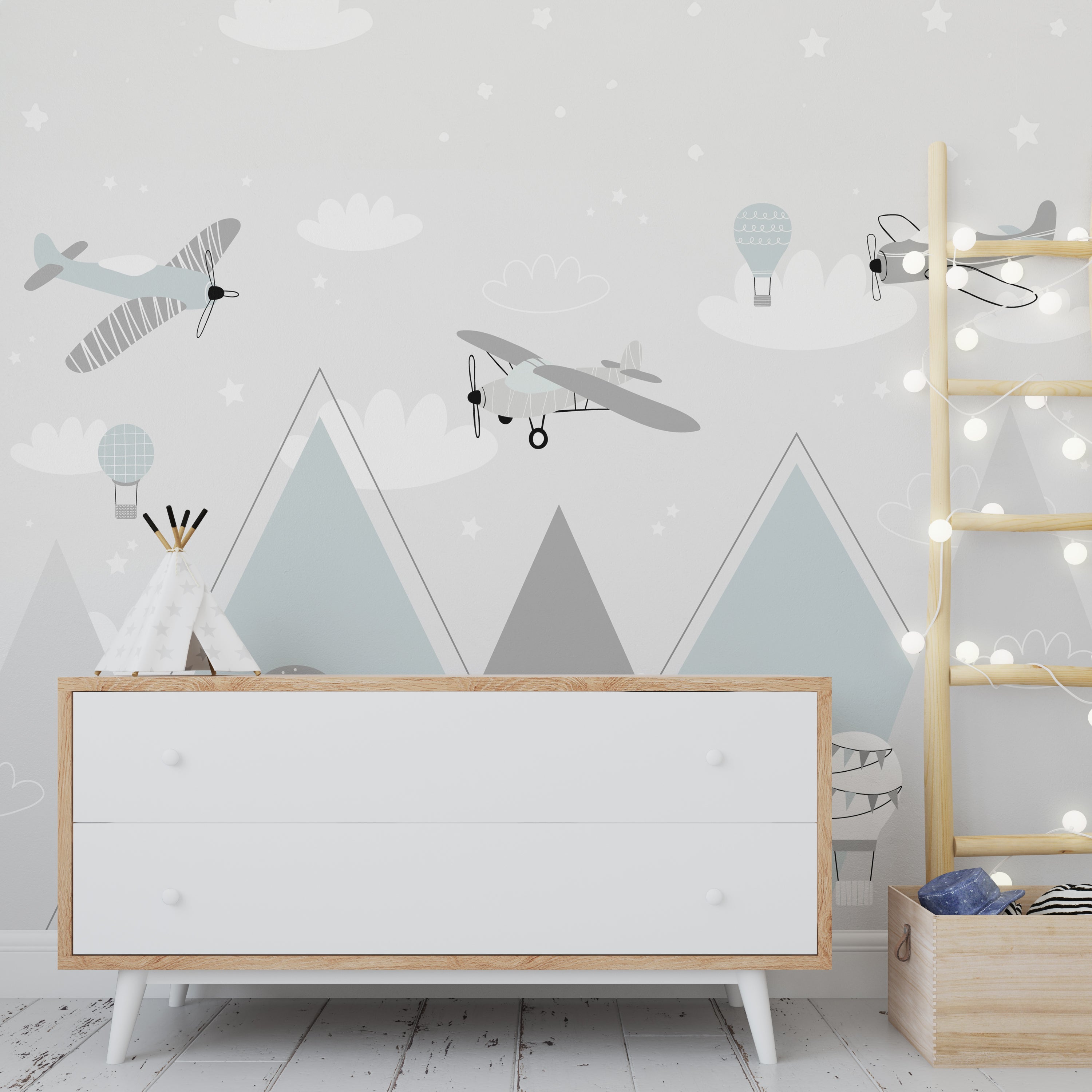 Wallpaper Kids Nursery Dubai Peps Wall A wall decal featuring various planes and hot air balloons in a stylized mountainous landscape with blue sky and stars.