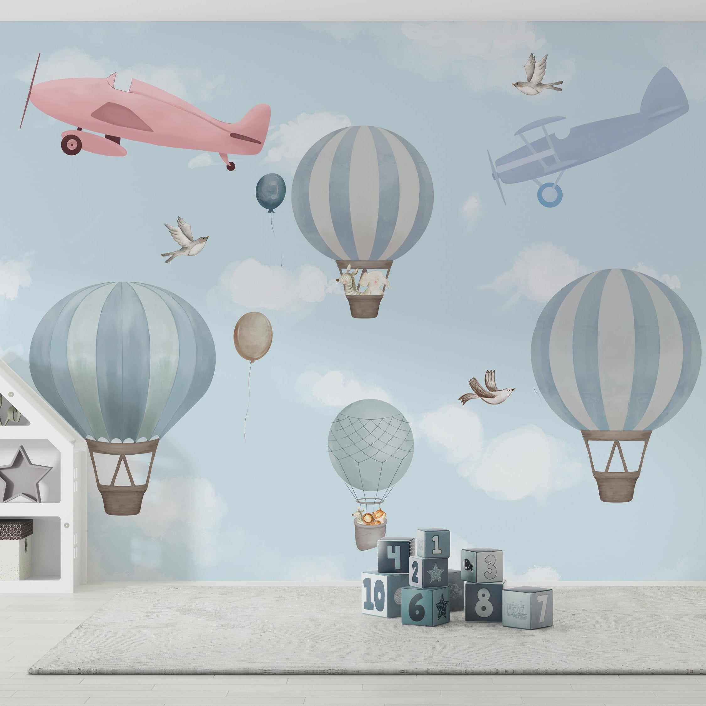Wallpaper Kids Nursery Dubai Children's room with wallpaper featuring hot air balloons and airplanes.