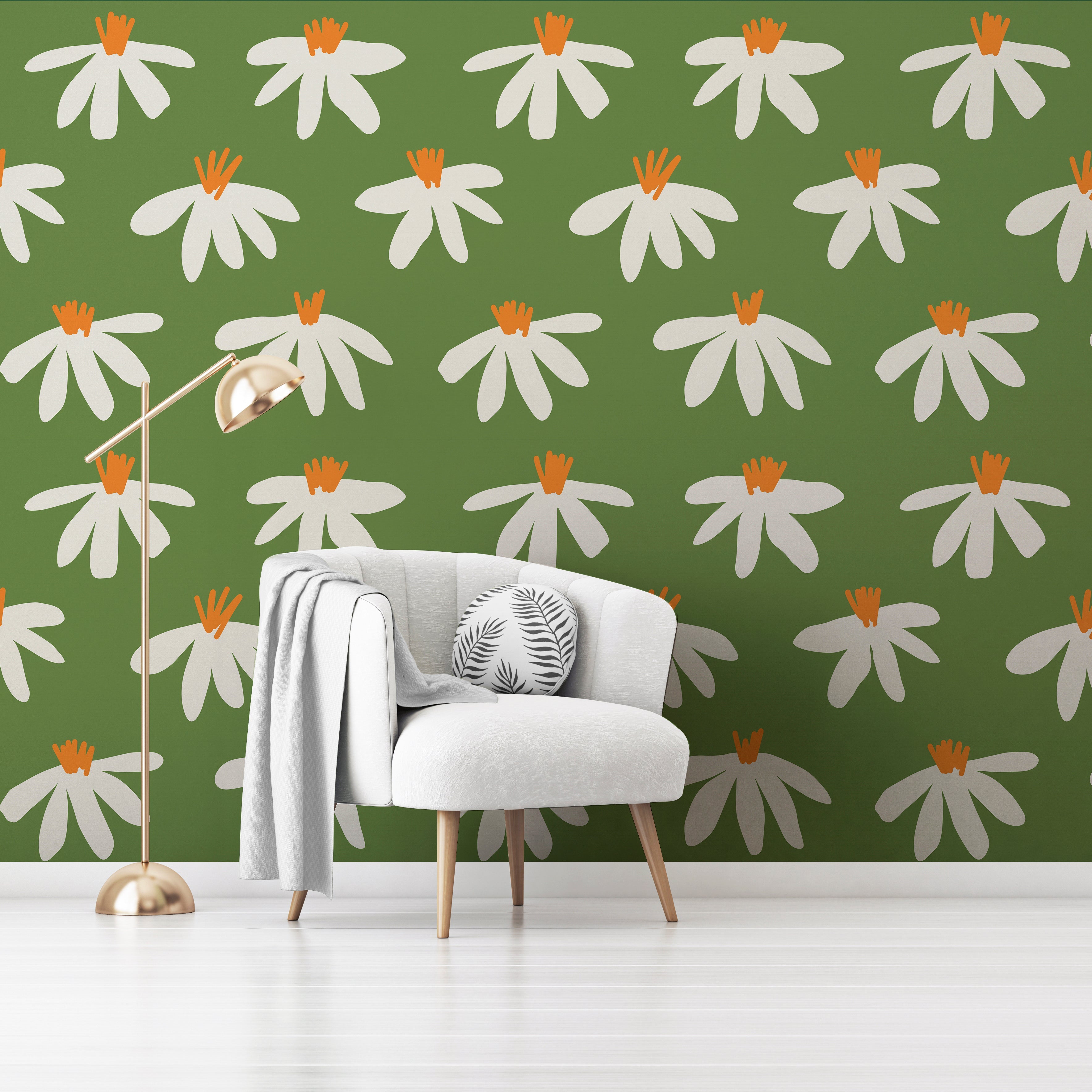 Wallpaper Kids Nursery Dubai A room with green walls covered in a floral pattern with white and orange flowers. There is a white armchair in the room with a gray cushion on it, and a floor lamp with a beige lampshade is also visible.