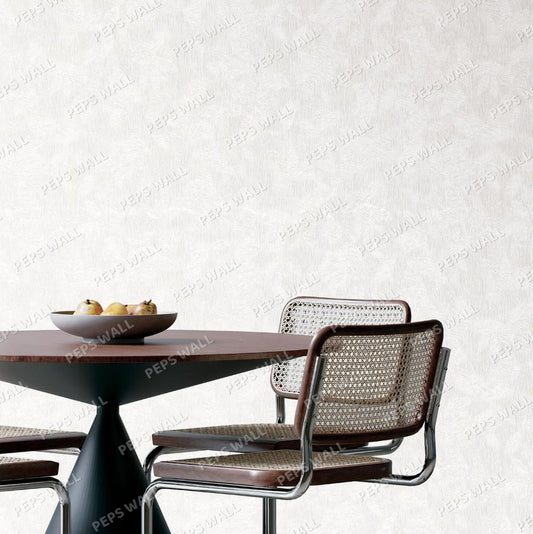 White textured fabric with a subtle gray leaf pattern.